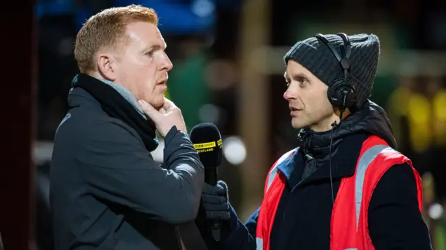 Neil Lennon and BBC reporter Jonathan Sutherland