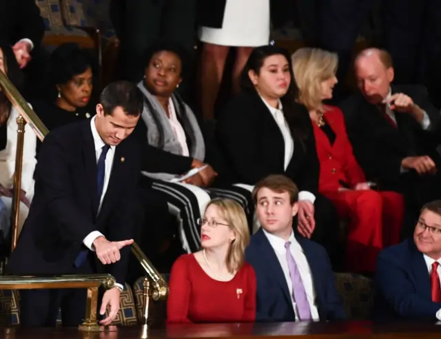 Venezuelan Opposition leader Juan Guaido gestures before the start of the State of the Union