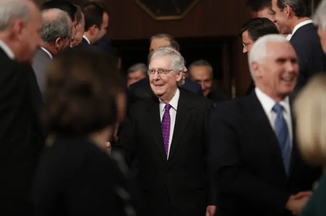 Senate Majority Leader Mitch McConnell dons a purple tie