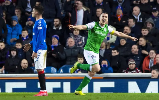 Paul Hanlon celebrates his opener at Ibrox