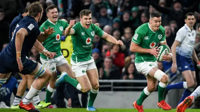 Johnny Sexton scores a try for Ireland against Scotland last week