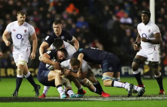 Players battle for the ball