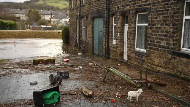 Flooded streets in in Mytholmroyd, West Yorkshire