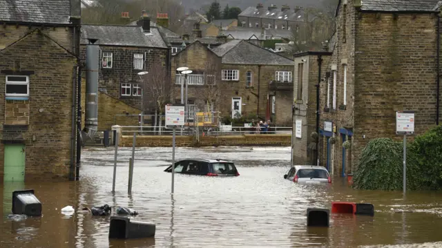 Flooded streets in in Mytholmroyd, West Yorkshire