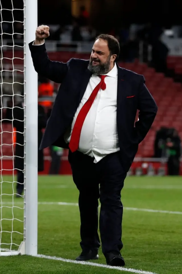 Evangelos Marinakis celebrates on the pitch after a Europa League football match between Arsenal and Olympiakos at the Emirates stadium in London. Photo: 27 February 2020