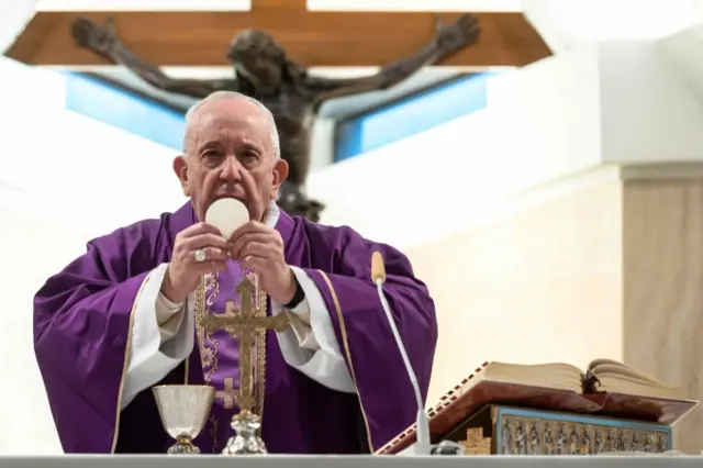 Pope Francis celebrates a daily mass alone in the Santa Marta chapel at the Vatican (10 March 2020)