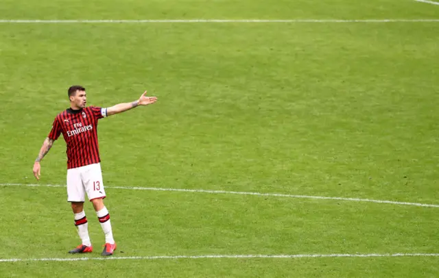 Alessio Romagnoli of AC Milan gestures during the Serie A match between AC Milan and Genoa