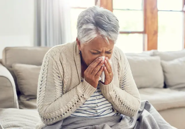 Woman coughing