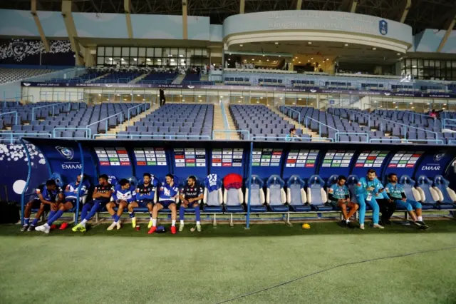 Stands are seen empty at a football stadium