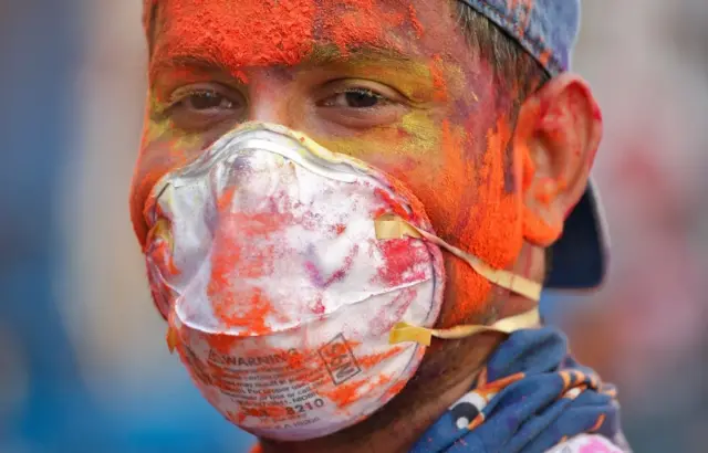 A man wears a protective mask in Chennai, India