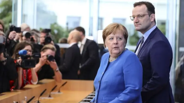 Angela Merkel and Jens Spahn at press conference