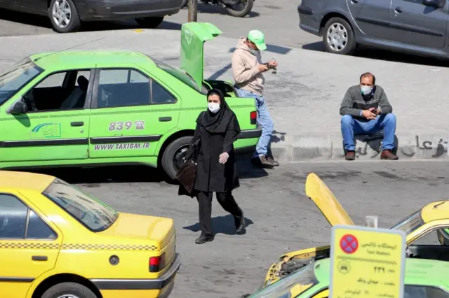 Iranian taxi drivers wait for customers in Tehran (10 March 2020)