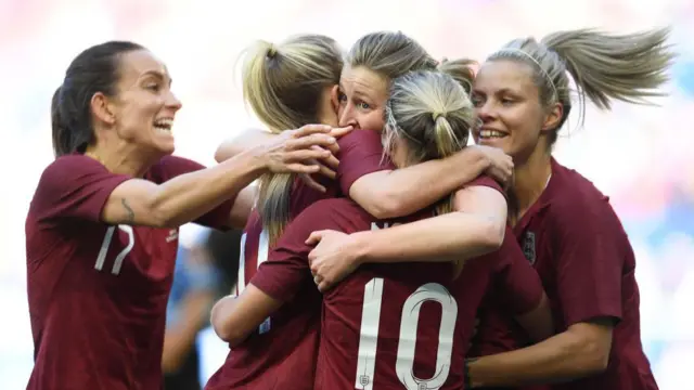 England players celebrate against Japan