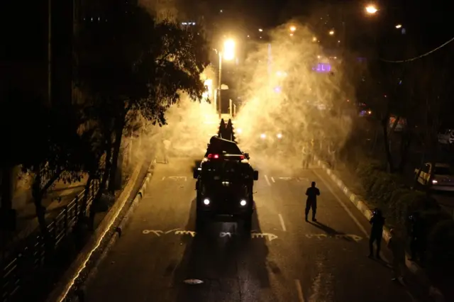 This picture from AFP / Getty shows Iranian firefighters disinfecting streets in southern Tehran.