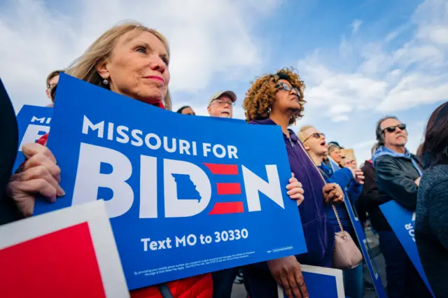 A Joe Biden supporter displays a sign during the Joe Biden Campaign Rally in Kansas City