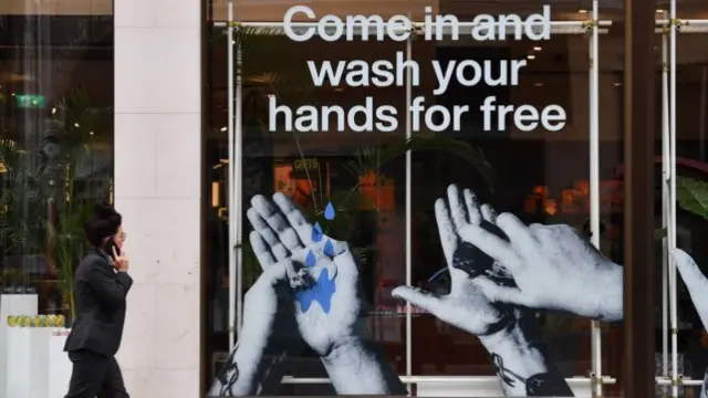 A cosmetics shop in Liverpool, England, advertises free handwashing facilities