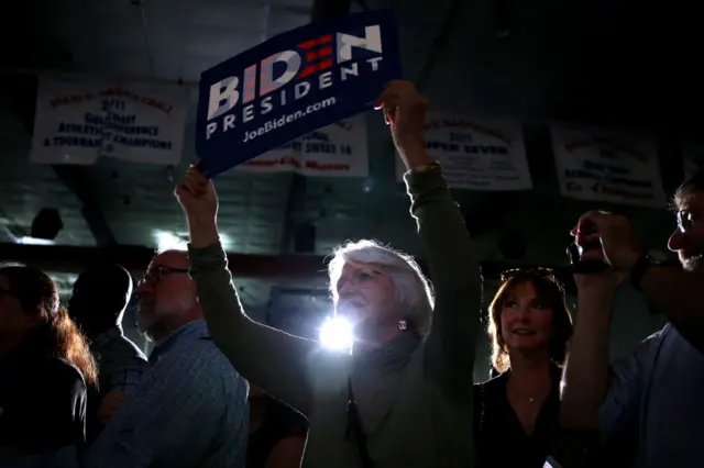 A supporter holds a sign during a campaign event for Democratic presidential candidate former Vice President Joe Biden at Tougaloo College on March 08, 2020 in Tougaloo, Mississippi