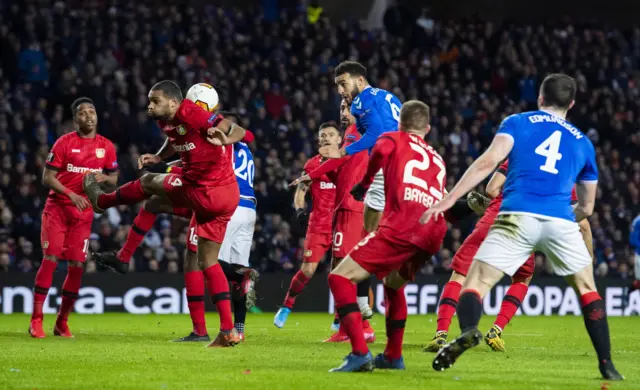 Rangers wanted a penalty for this incident, as Connor Goldson heads the ball into Jonathan Tah