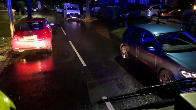 Fire engine trapped by parked cars