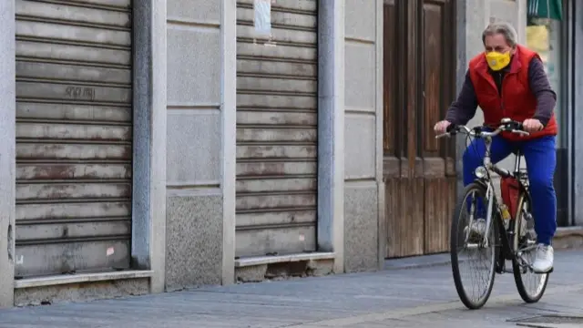 A cyclist in Codogno, pictured on 11 March