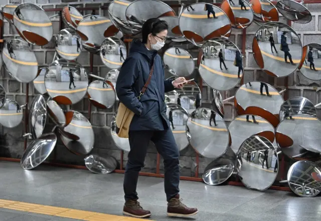 A passenger at a subway station in Seoul