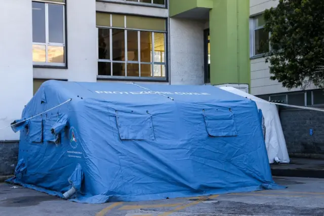 This picture from the Cardarelli hospital in Naples shows a tent being used to screen patients, before they enter the main building.