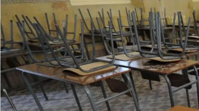 Tables and chairs in a classroon in Algiers