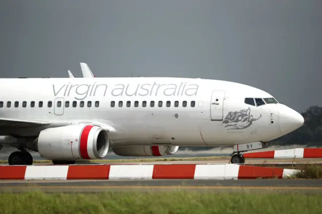 A Virgin Australia plane on a tarmac