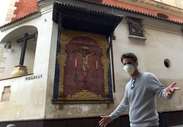 A man wearing a protective mask in Seville