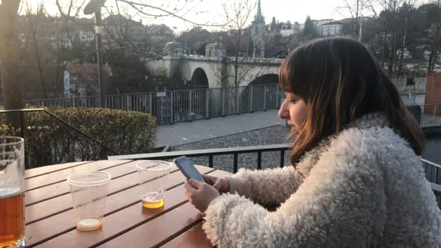 Swiss residents like Nadine are heading to the bars for a last beer