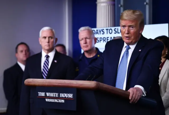 Donald Trump speaks during a press briefing at the White House in Washington