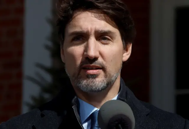 Canada's Prime Minister Justin Trudeau speaks to news media outside his home in Ottawa, Ontario, Canada March 16