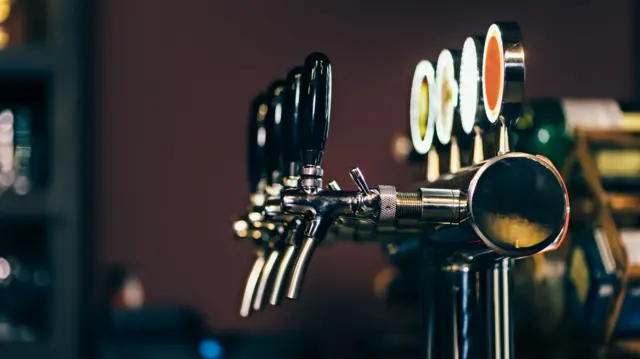 Beer taps in bar