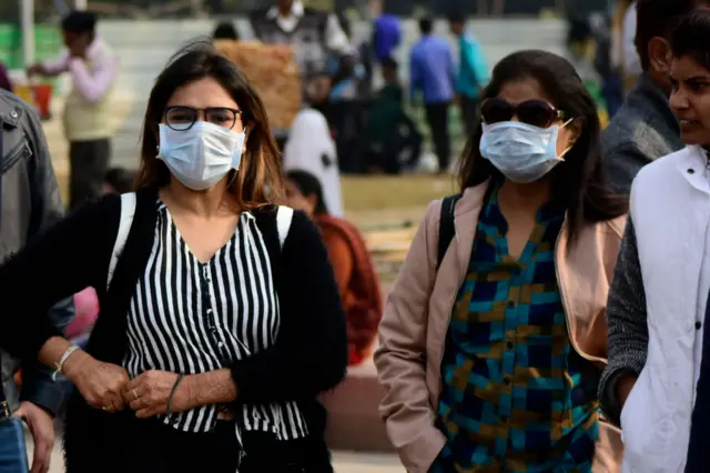 People wear masks following the Coronavirus scare in New Delhi India on 01 February 2020.