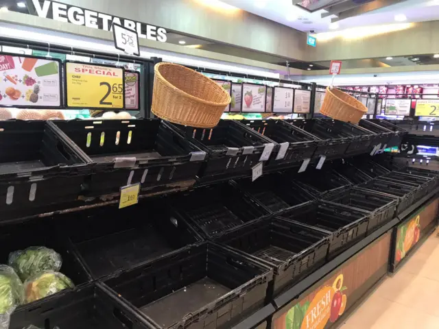 Empty shelves in Singapore supermarket