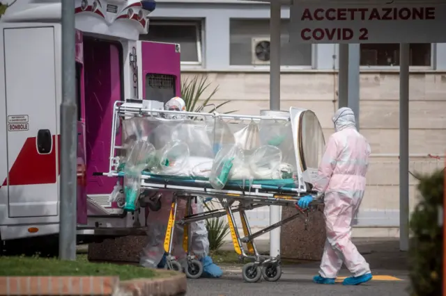 An ambulance arrives at a hospital Rome, Italy