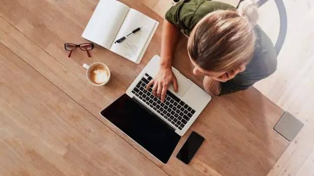 Woman working on a laptop