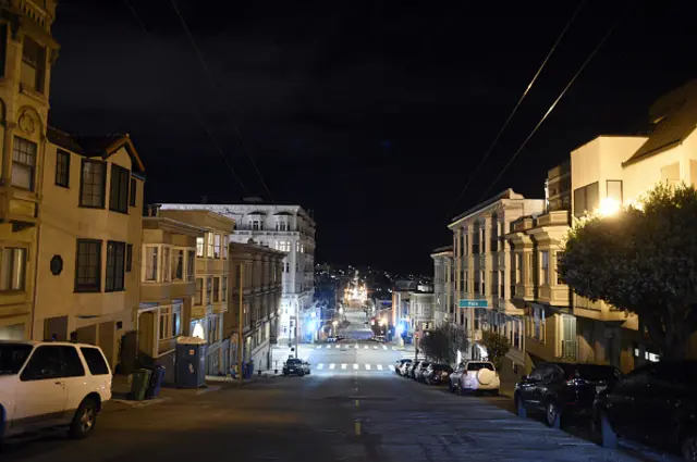 Streets in San Francisco are seen after midnight as residents went home to begin the 3-week process of sheltering in place, on March 18, 2020