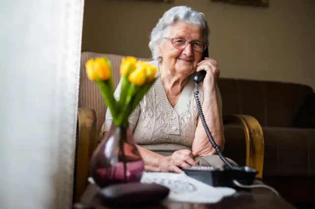 Older woman with phone