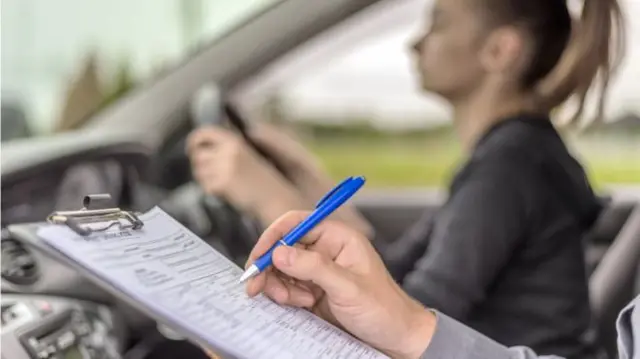 A driving test being carried out