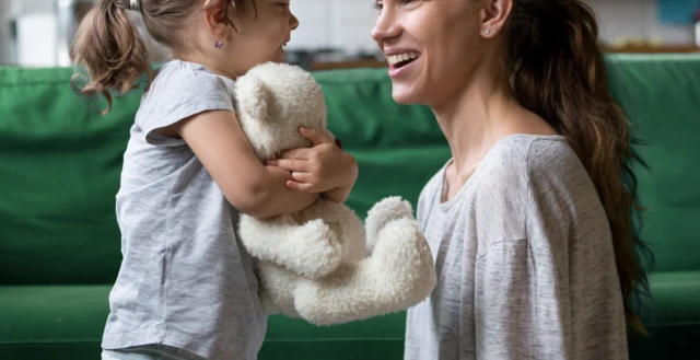 Stock image of a woman with a small child