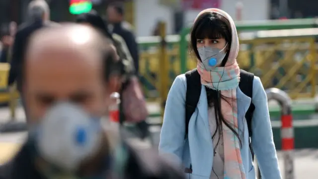 A woman in a medical mask in Tehran