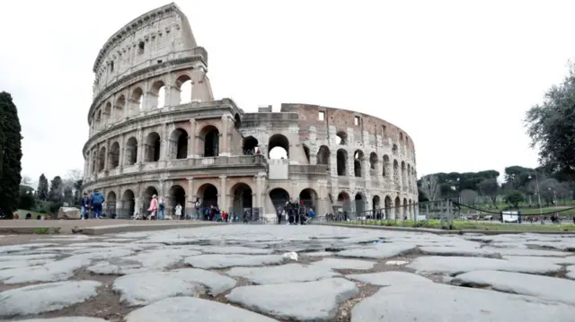 Few tourists are seen in the area surrounding the Colosseum in Rome, Italy, 2 March 2020