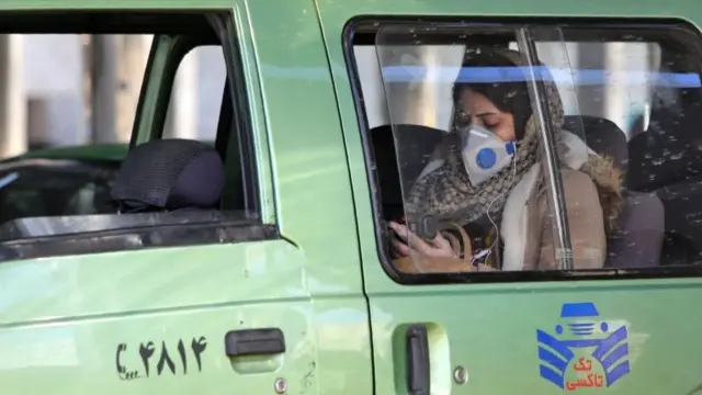 Iranian woman wearing protective mask