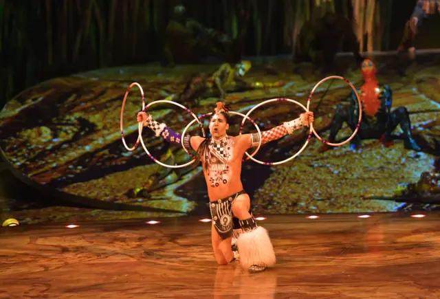 Canadian circus troop "Cirque du Soleil" performs in their acrobatic performance during the premiere of "Totem"