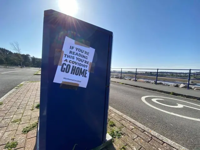 A sign at Barry Island saying 'go home'