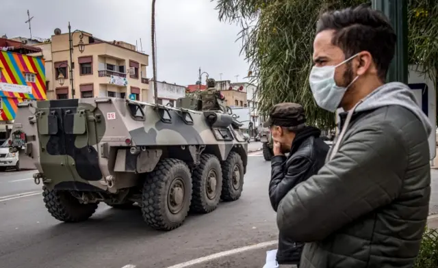 Military vehicles on street