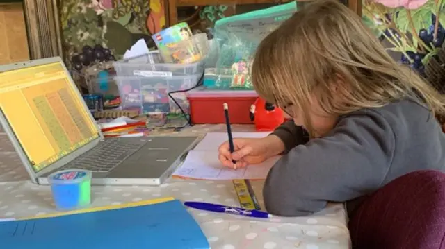 child at desk