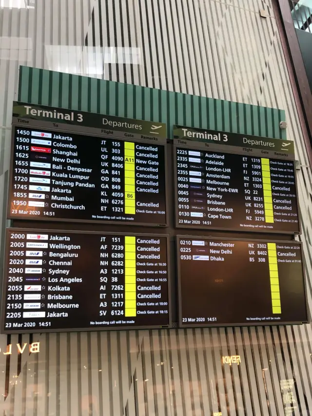 Departure board at Changi Airport terminal 3,  23 March 2020