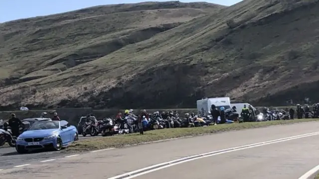 Motorcyclists parked on the side of road by Storey Arms